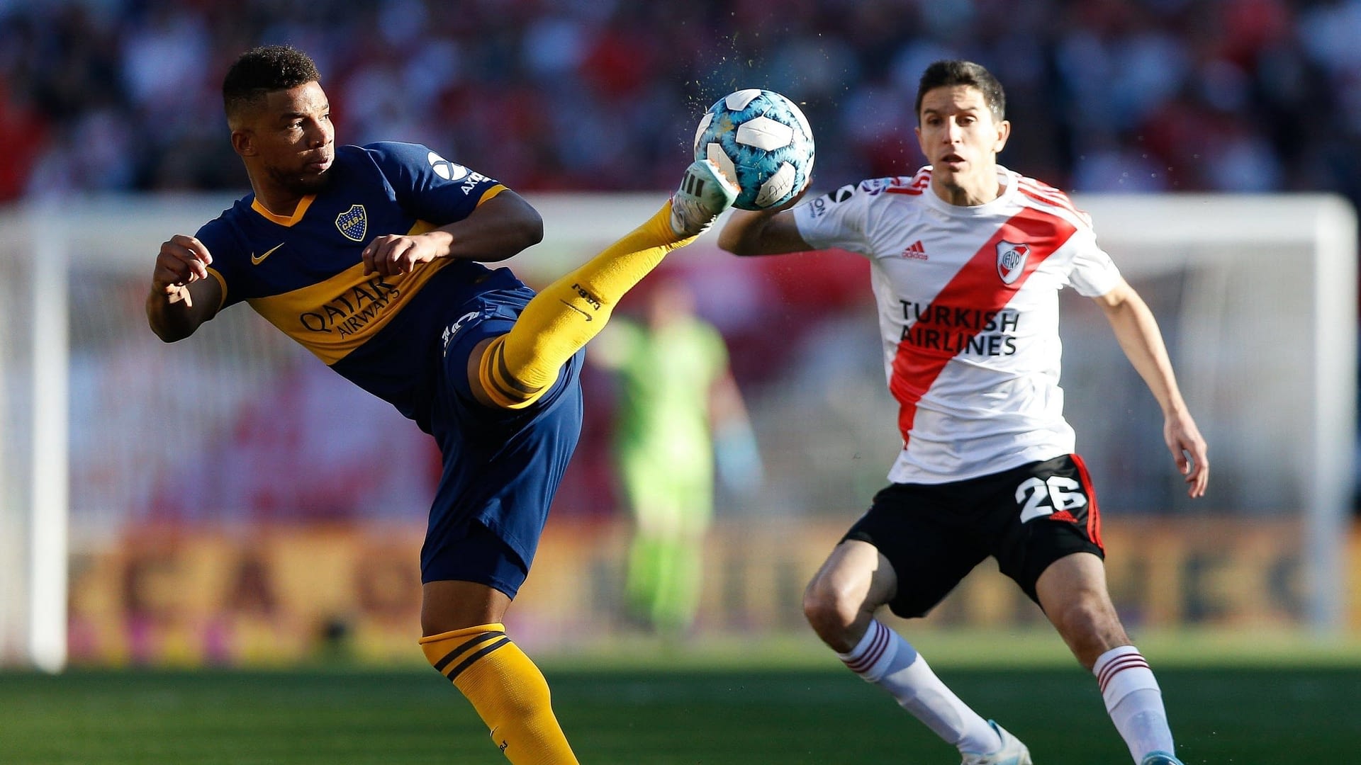 Boca Juniors Frank Fabra (L) vies for the ball with River Plate s Ignacio Fernandez (R)