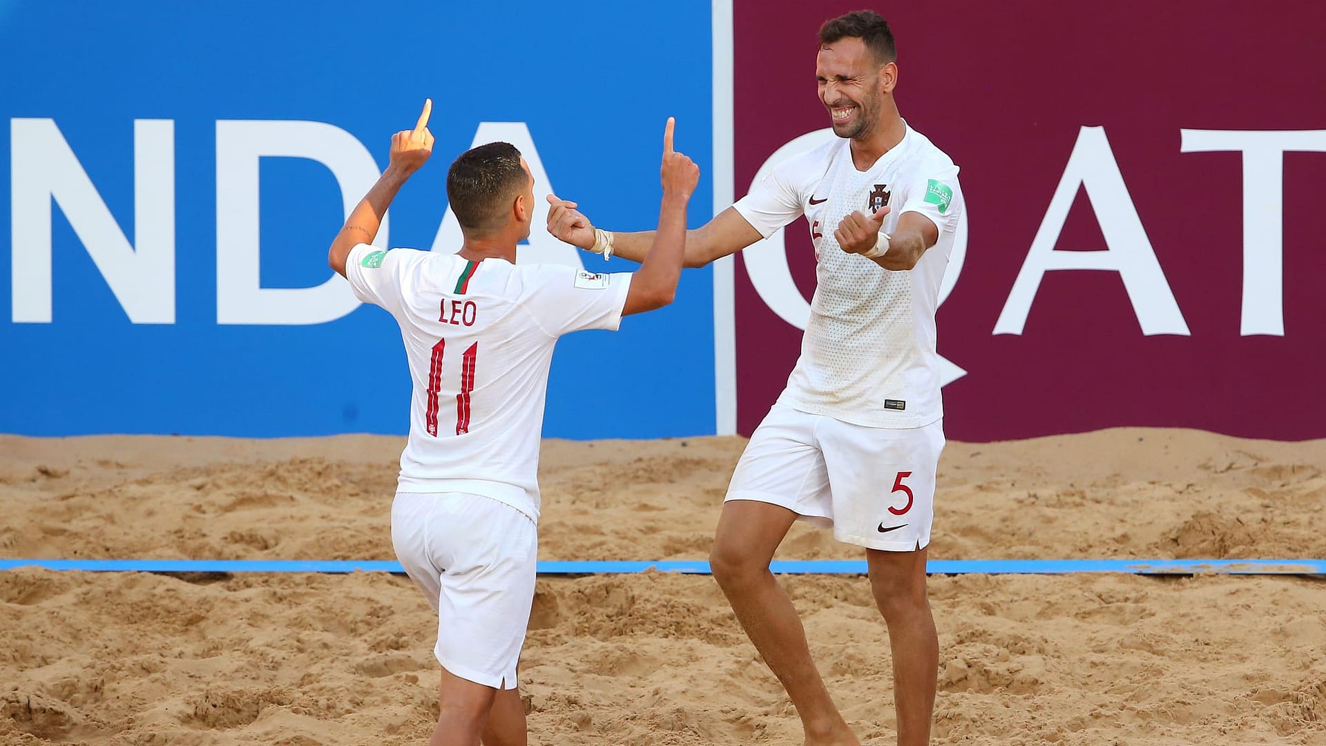 Jordan of Portugal celebrates with teammate Leo Martins after scoring his team's fourth goal