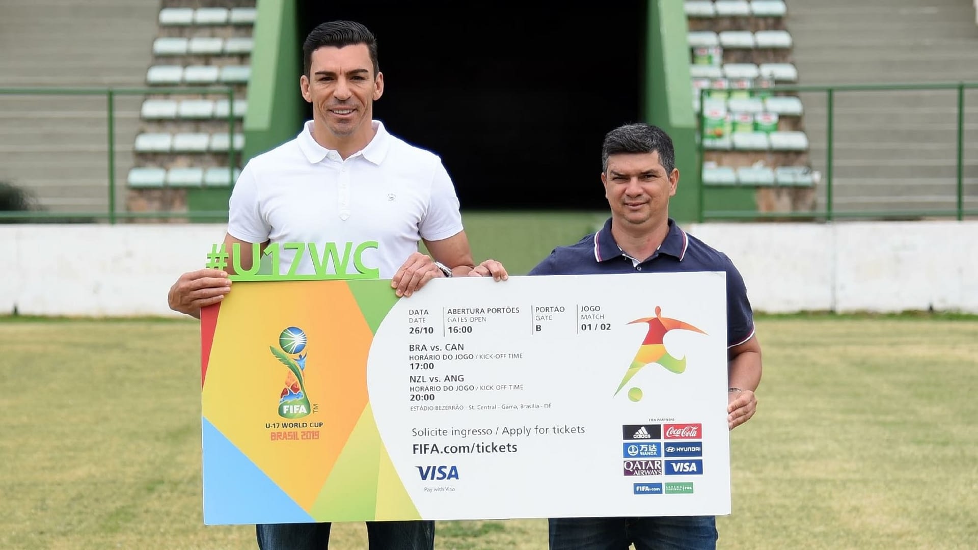 Brazilians Lucio and Anailson hold a giant ticket of FIFA U17 World Cup Brazil 2019